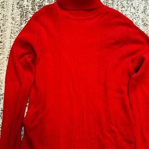 Style in lightly ribbed red T-neck.